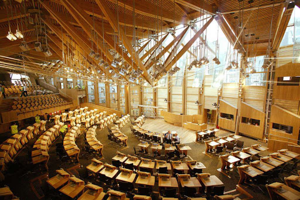 The Scottish Assembly opened in 2004, 3 years late at cost of £414 million (Credit: EMBT)