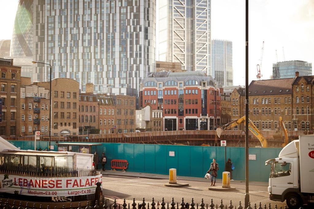 The cleared site of the London Fruit and Wool Exchange, with Bell Lane beyond, Toby Glanville
