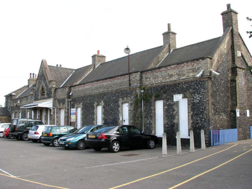 The front facade of Brandon Station, with its distinctive flint facing (Credit: Geograph)