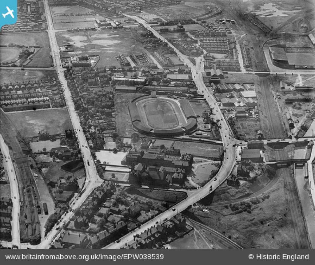 Aerial view of Old Trafford in 1932, the Bowling Club to the left hand side (Britain from Above))
