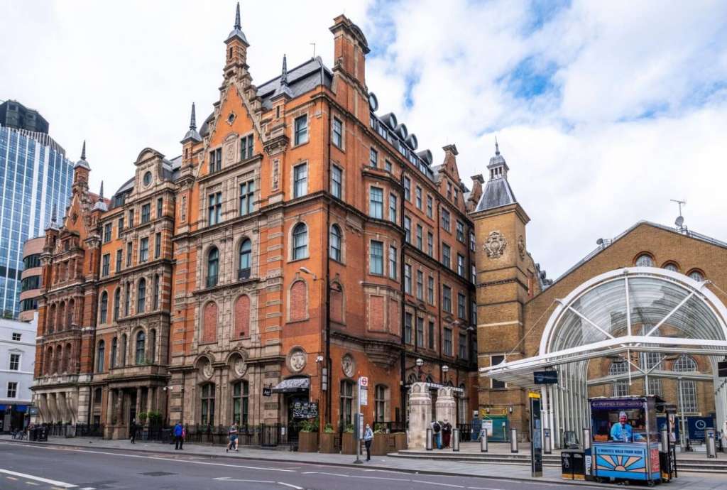 The former Great Eastern Hotel (left) next to the station has been upgraded to Grade II*