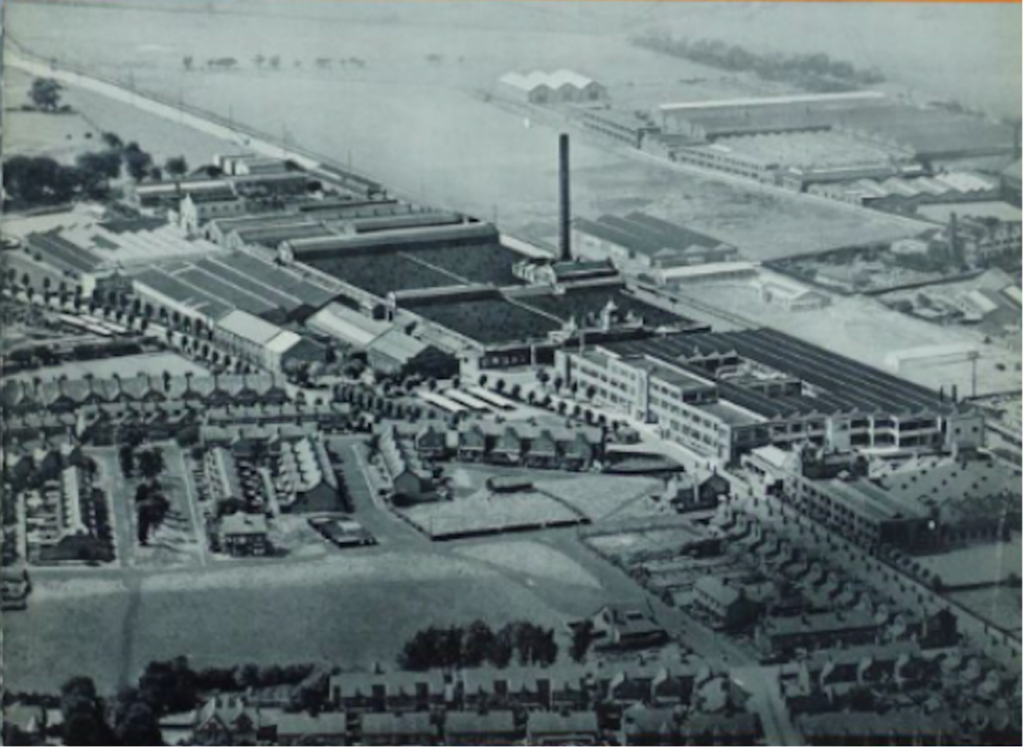Aerial view of the Linotype Works, dominated by the 58.7 metre chimney (Photo: Trafford Local Studie