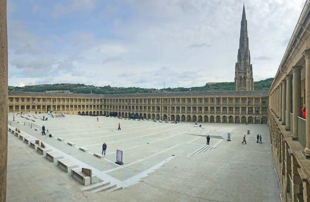 The Piece Hall, Halifax, an 18th-century cloth hall which now houses history exhibits, shops, bars &
