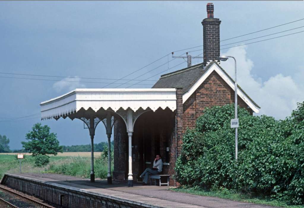 A passenger waits at Salhouse Station in 2005 (Credit: Alamy)