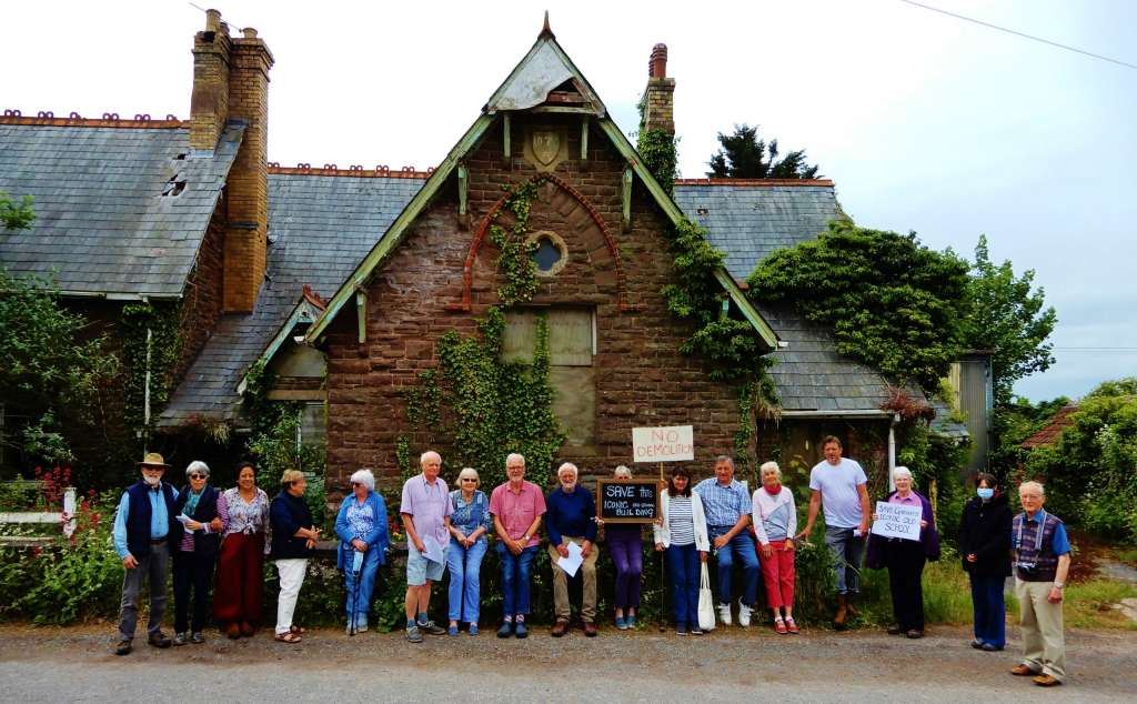 Residents of Garway outside the Old School in protest against its proposed demolition