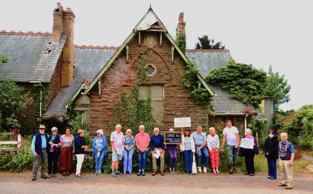 Residents of Garway gather outside the Old School in protest of its demolition